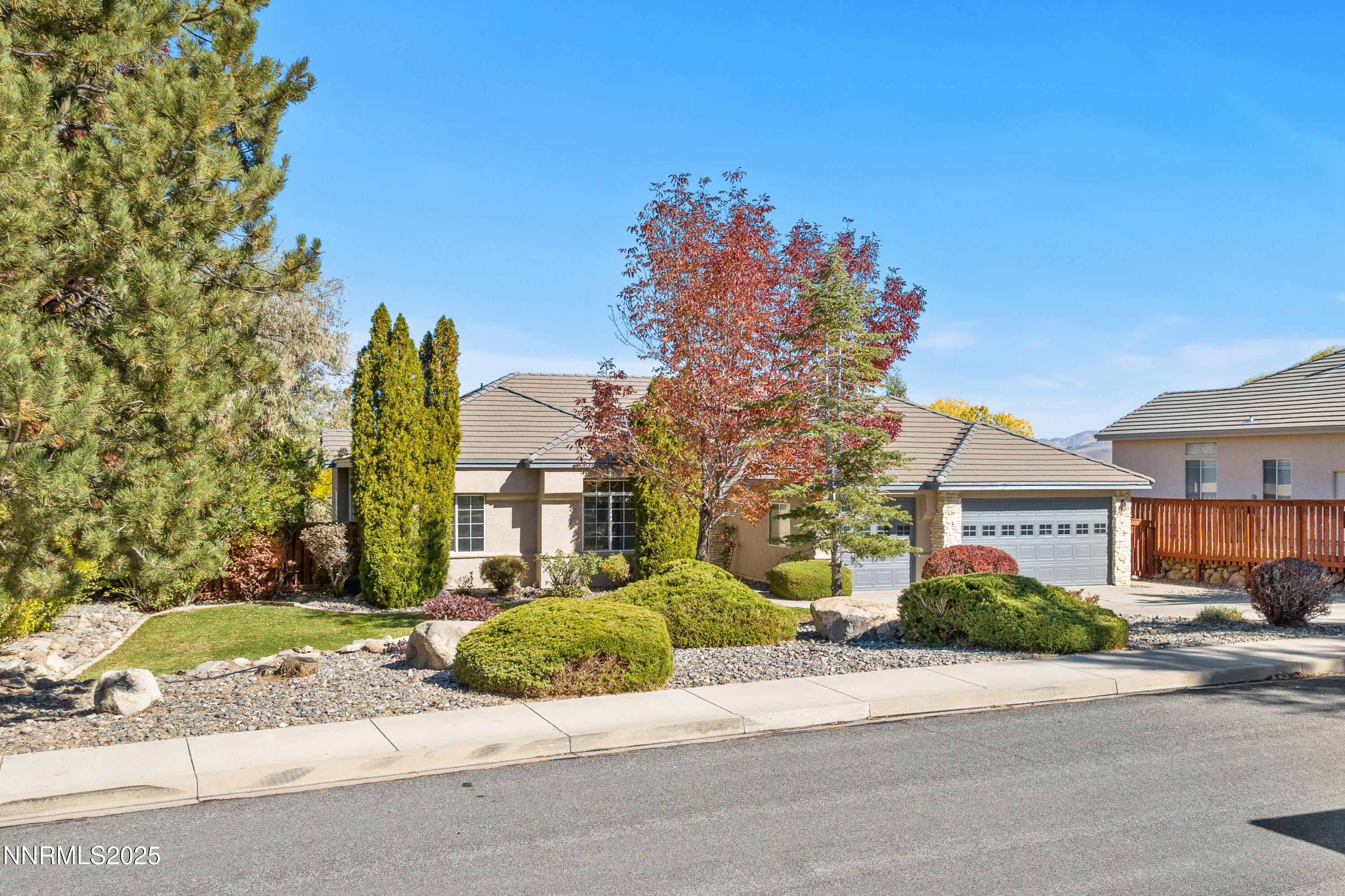 4991 West Albuquerque Road Reno, NV 89511 - Photo 58 of 60 a front view of a house with a yard