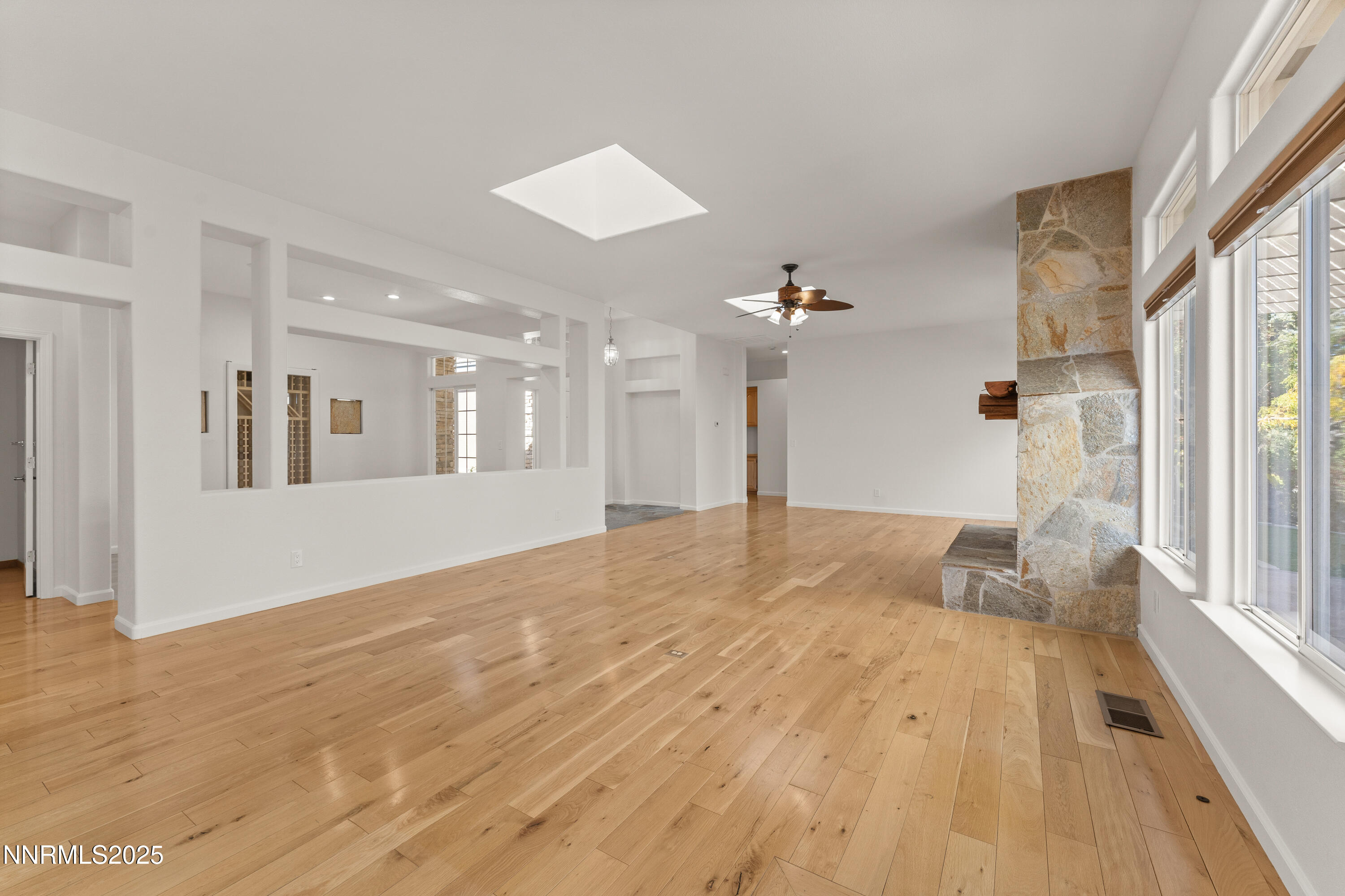 4991 West Albuquerque Road Reno, NV 89511 - Photo 10 of 60 a spacious bathroom with a granite countertop sink and a mirror