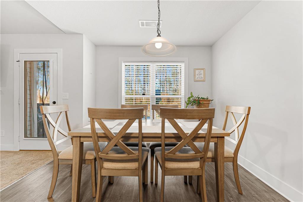 328 Walnut Drive Hartwell, GA 30643 - Photo 12 of 33 a view of a dining room with furniture and windows