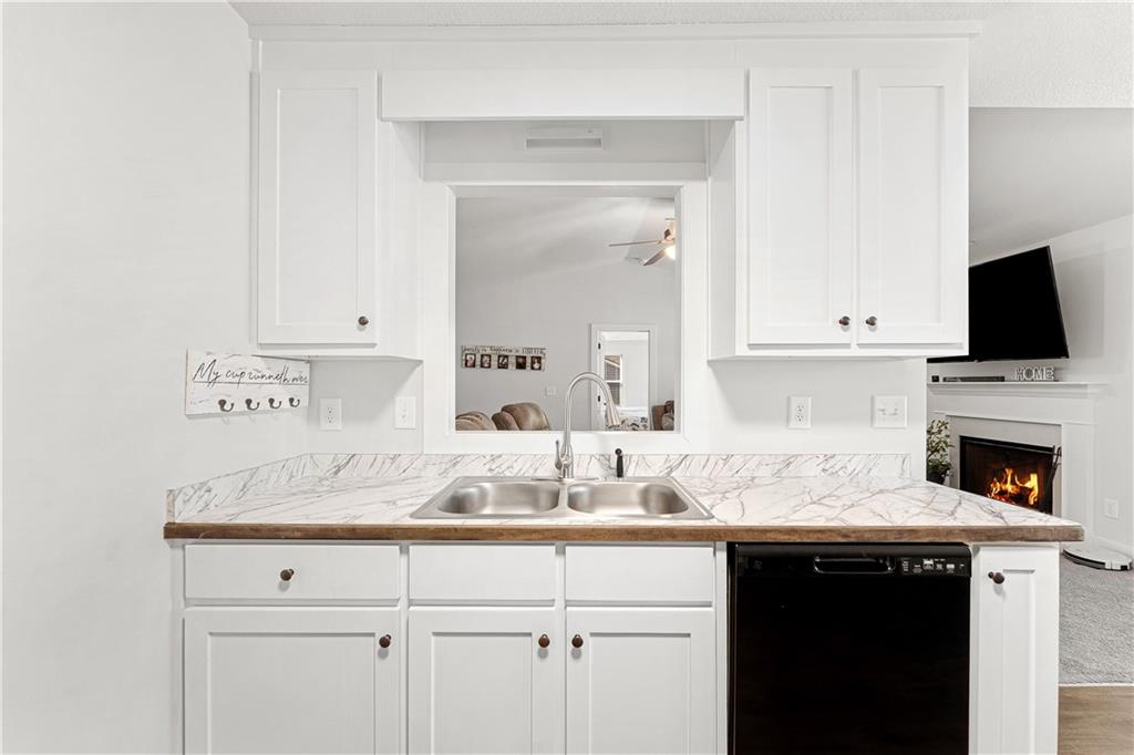 328 Walnut Drive Hartwell, GA 30643 - Photo 15 of 33 a kitchen with a sink and cabinets