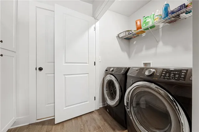 a utility room with dryer and washer