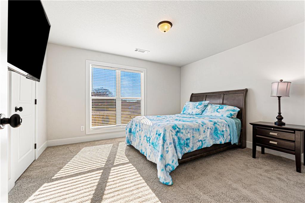 328 Walnut Drive Hartwell, GA 30643 - Photo 6 of 33 a bedroom with a bed and a window