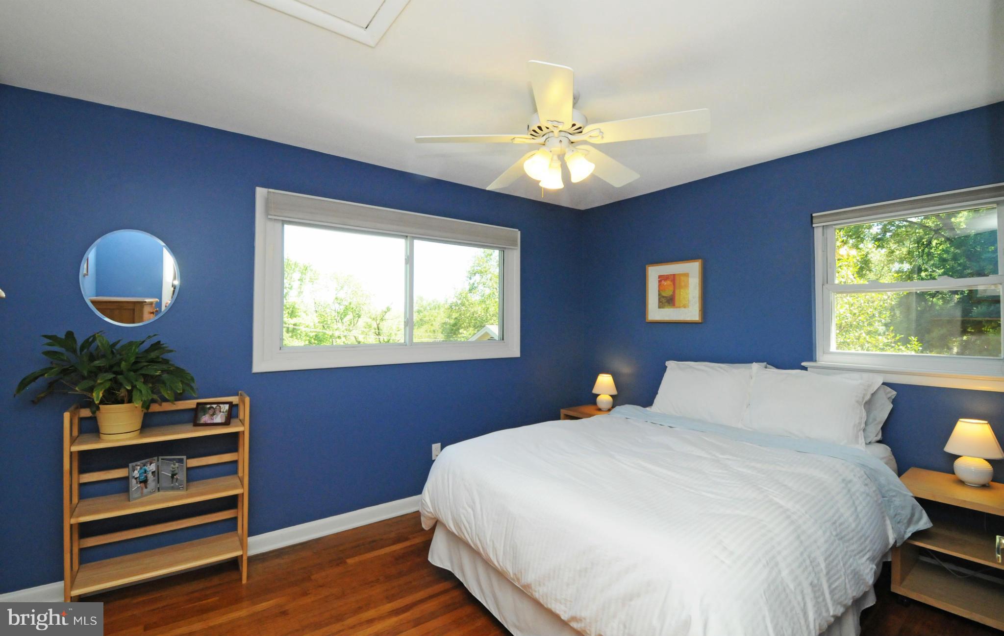 6313 Beryl Road Alexandria, VA 22312 - Photo 21 of 30 a bedroom with a bed and a chandelier