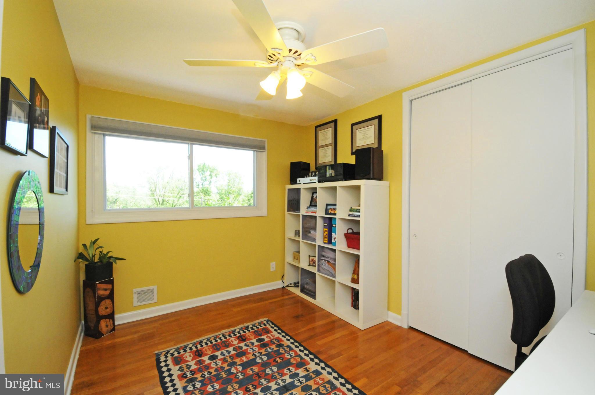 6313 Beryl Road Alexandria, VA 22312 - Photo 22 of 30 a view of a room with window and wooden floor
