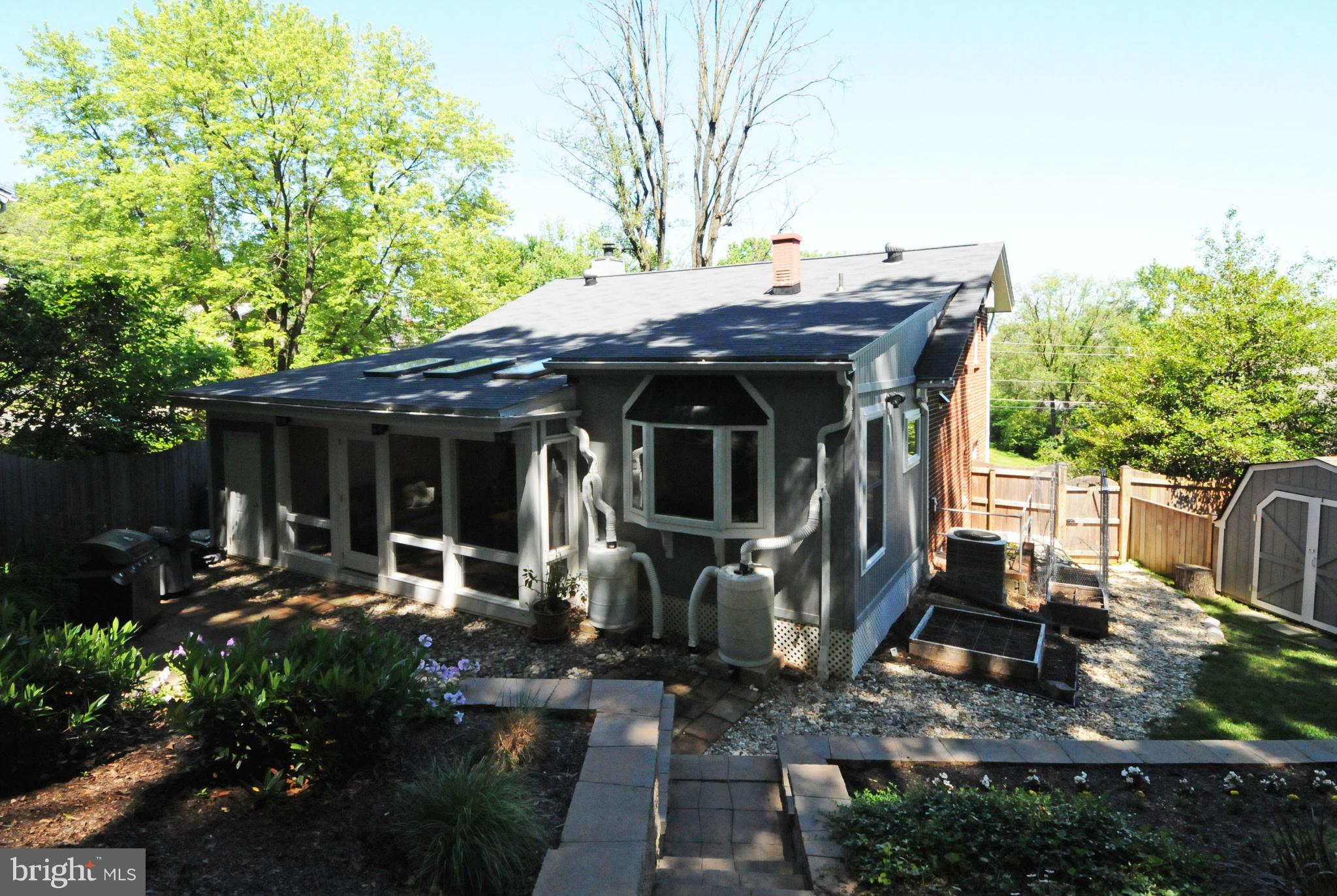 6313 Beryl Road Alexandria, VA 22312 - Photo 29 of 30 a view of a house with backyard wooden deck and furniture