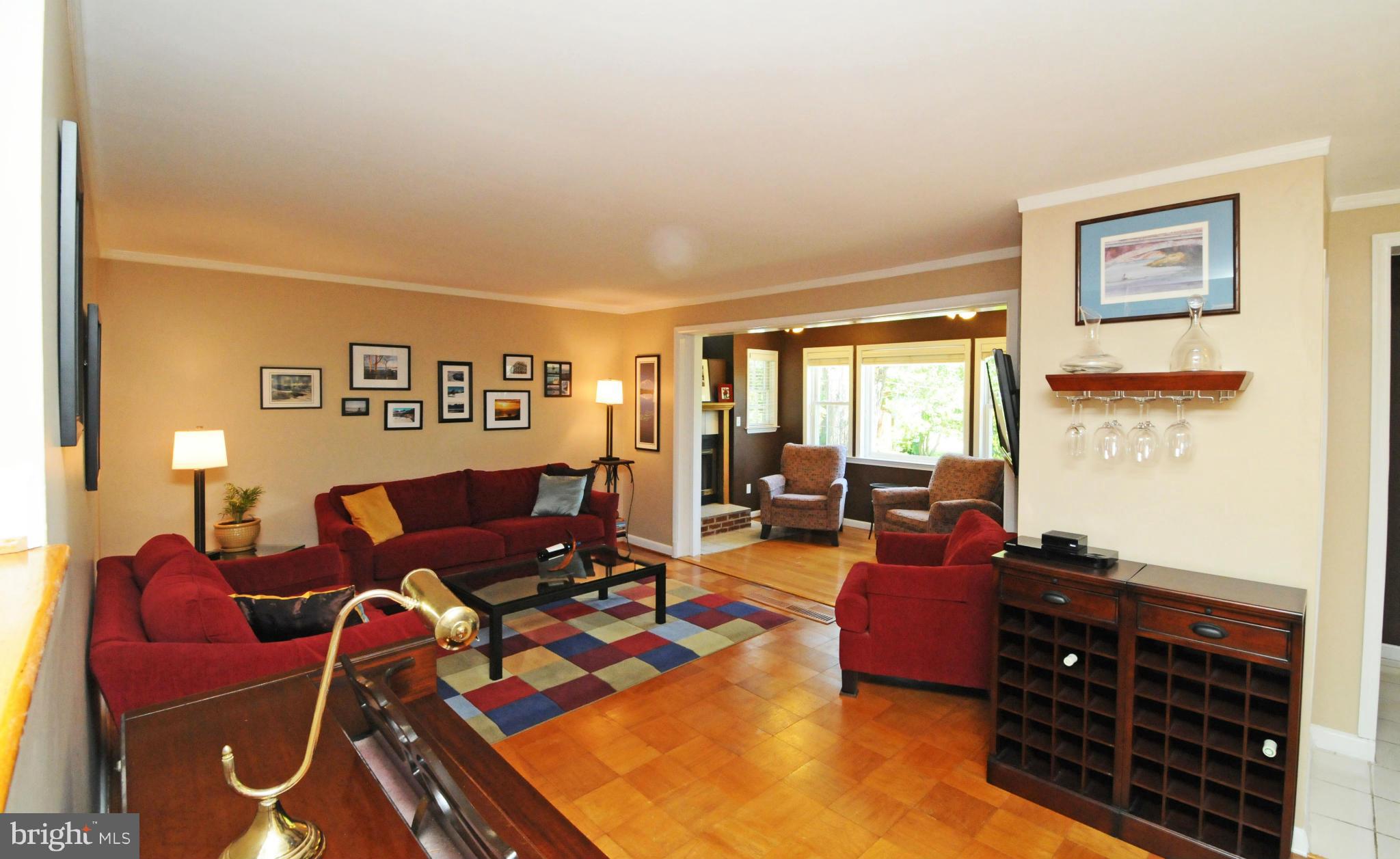 6313 Beryl Road Alexandria, VA 22312 - Photo 5 of 30 a living room with furniture and wooden floor