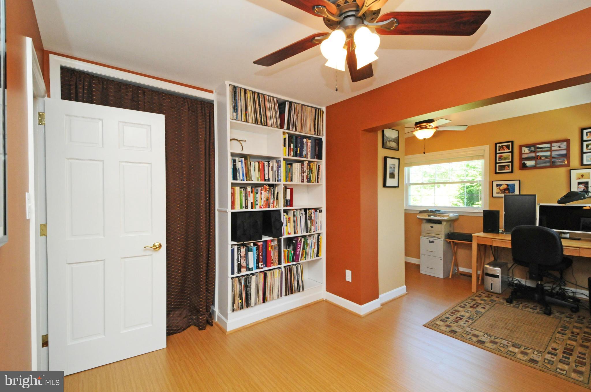 6313 Beryl Road Alexandria, VA 22312 - Photo 6 of 30 a room with furniture and a bookshelf