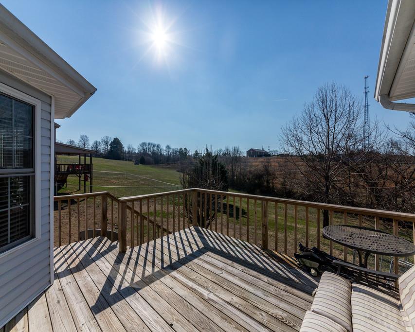 4212 Station Road Cunningham, TN 37052 - Photo 24 of 29 a view of balcony with wooden floor and city view