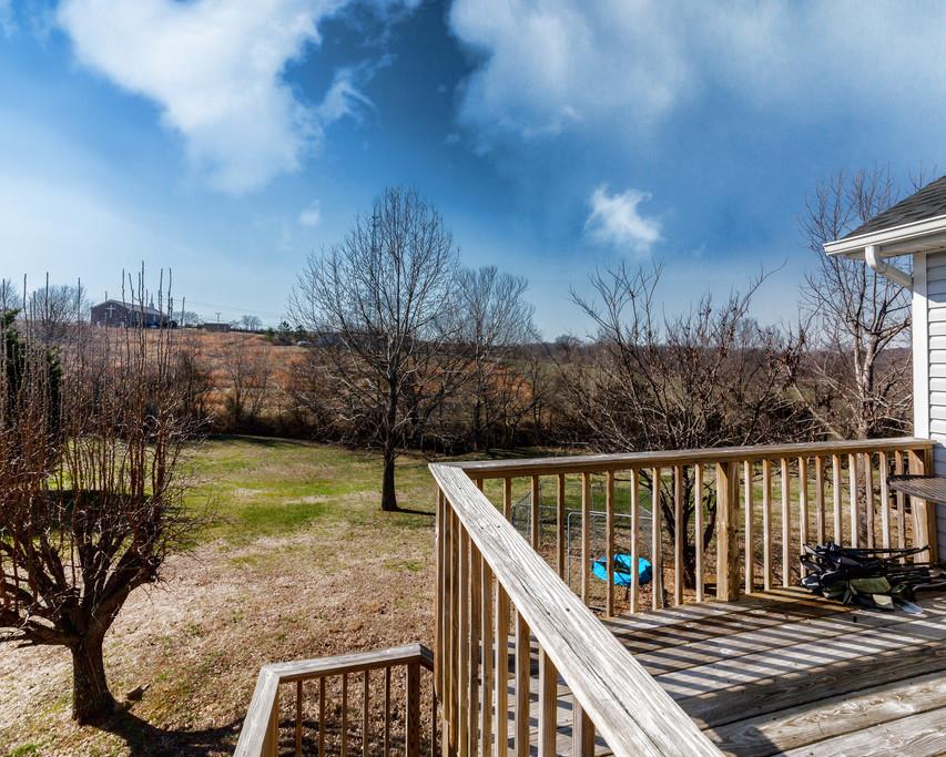 4212 Station Road Cunningham, TN 37052 - Photo 25 of 29 a view of a balcony with wooden floor