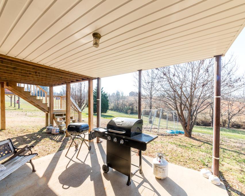 4212 Station Road Cunningham, TN 37052 - Photo 26 of 29 a living room with patio