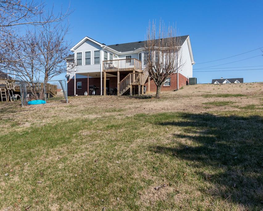 4212 Station Road Cunningham, TN 37052 - Photo 27 of 29 a front view of a house with a yard
