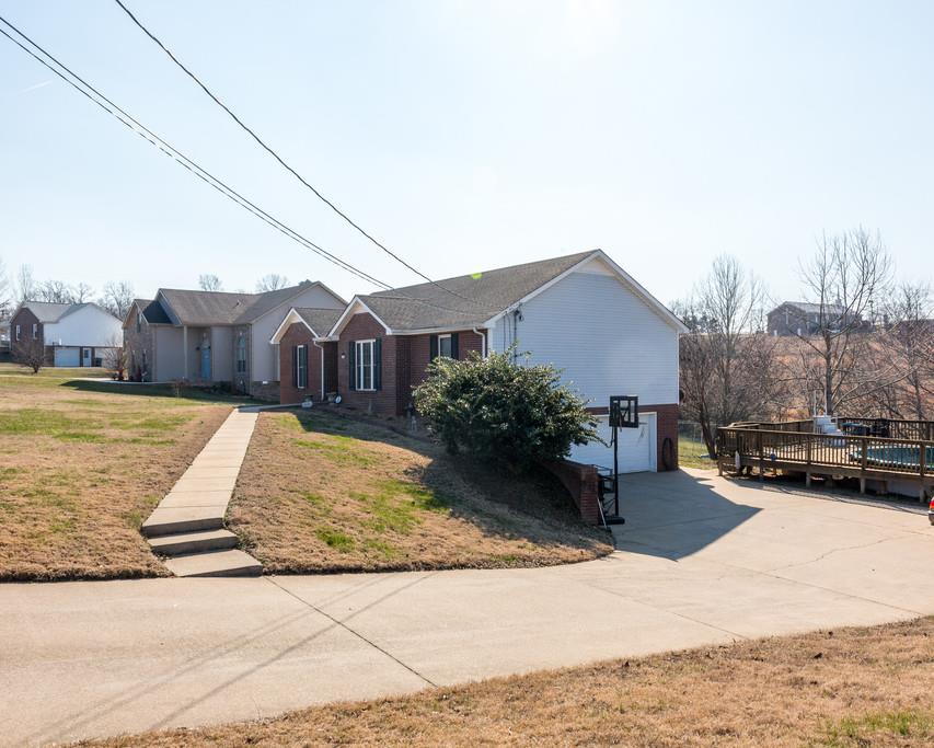 4212 Station Road Cunningham, TN 37052 - Photo 28 of 29 a view of a house with a yard