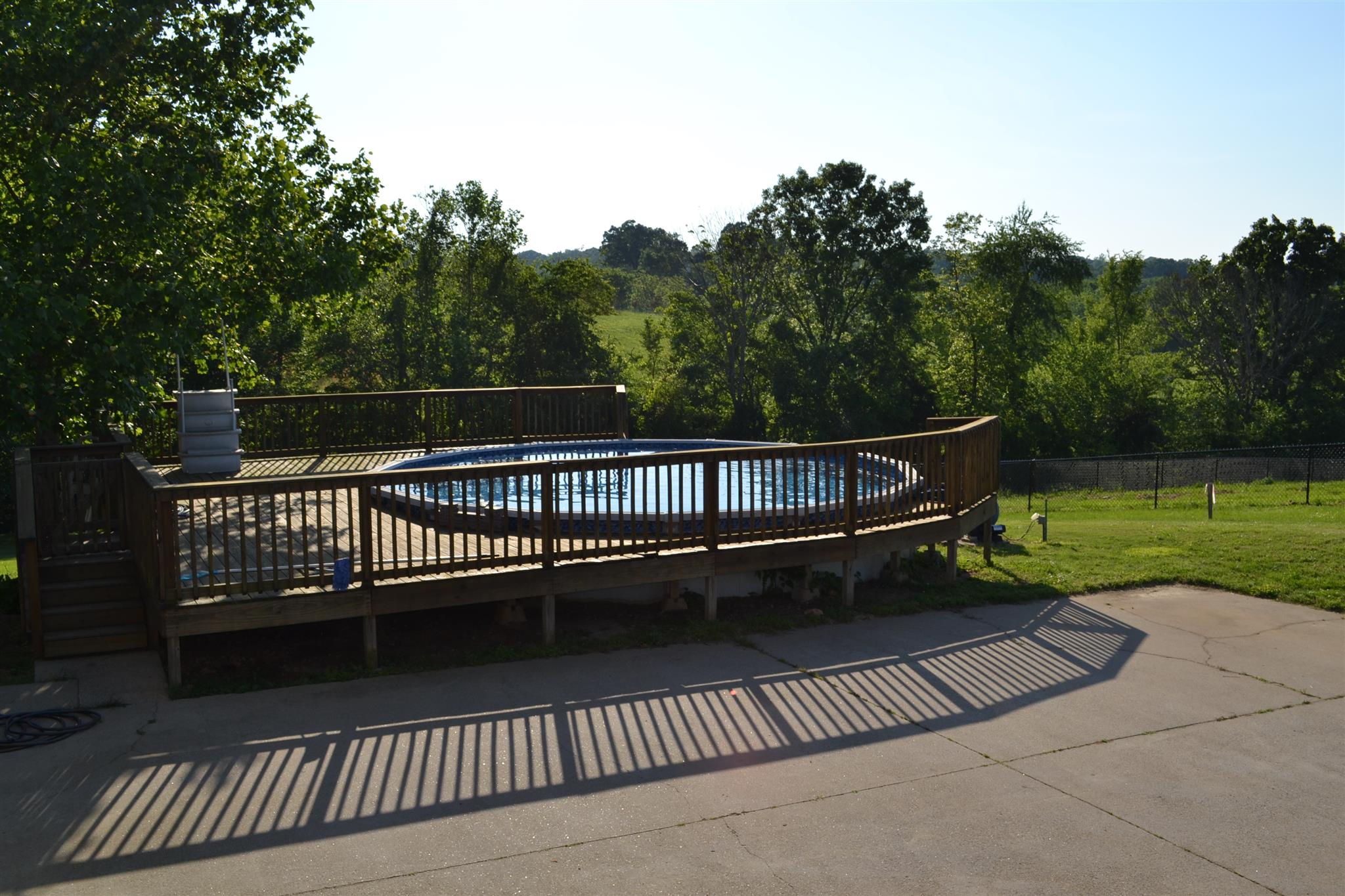4212 Station Road Cunningham, TN 37052 - Photo 29 of 29 a view of deck with wooden floor and outdoor seating