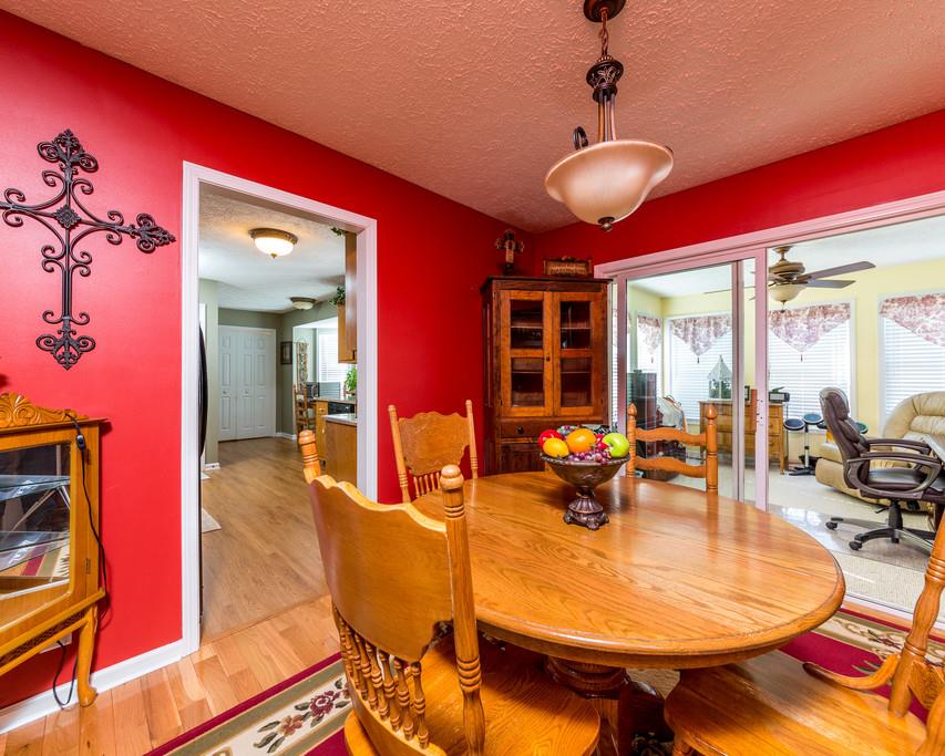 4212 Station Road Cunningham, TN 37052 - Photo 6 of 29 a view of a dining room with furniture wooden floor and chandelier