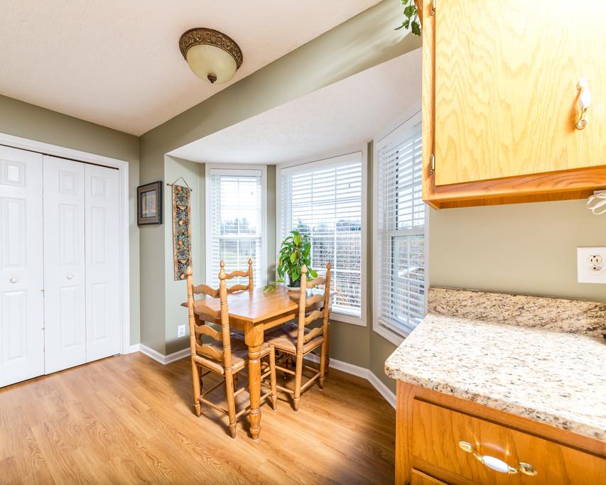 4212 Station Road Cunningham, TN 37052 - Photo 9 of 29 a dining room with wooden floor and window