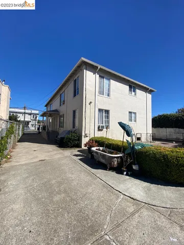 a front view of a house with yard