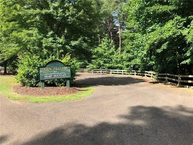 a view of swimming pool with an outdoor space and seating area