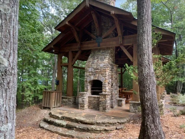 a view of a chair and table in the patio