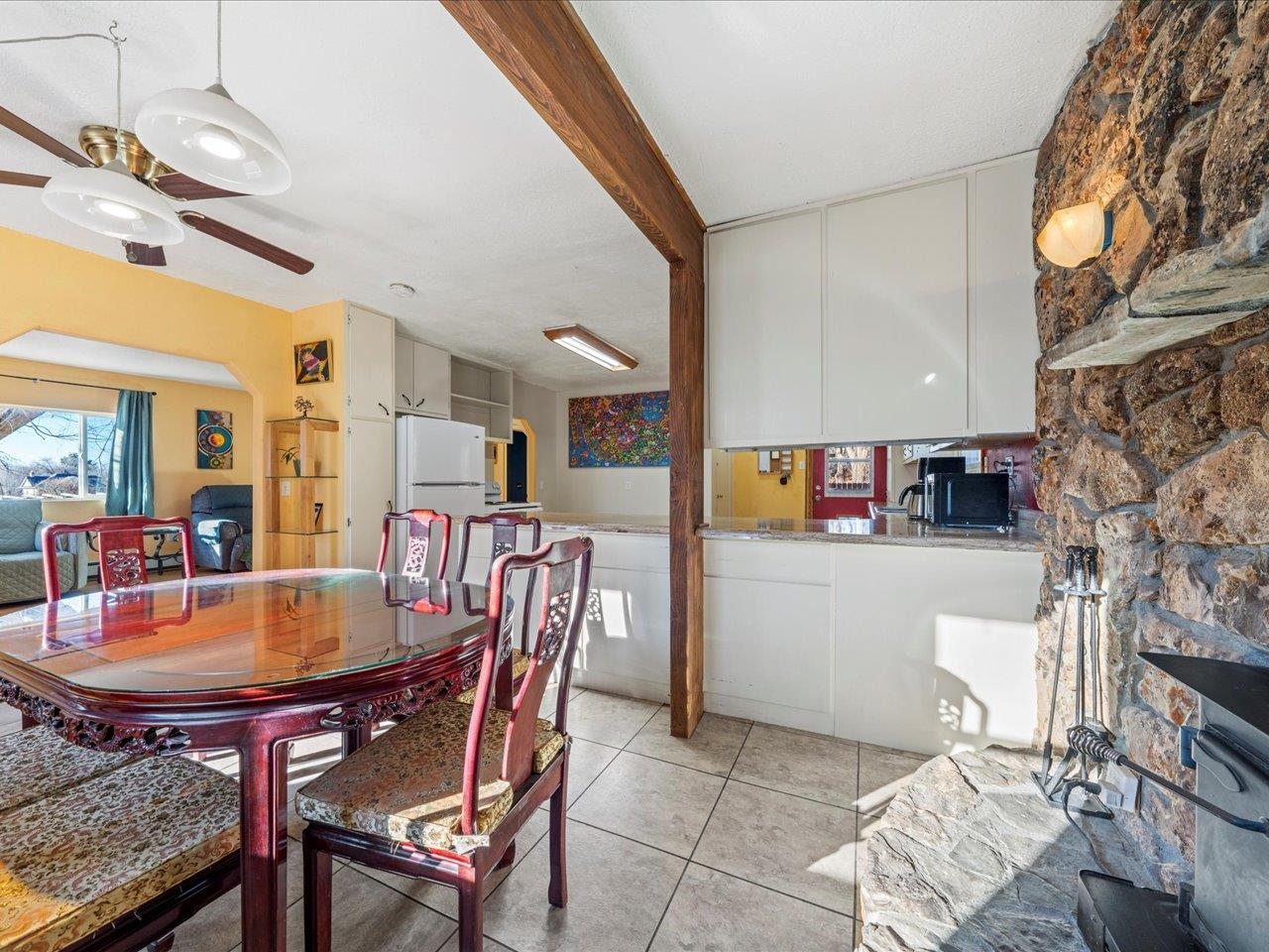 608 Bluff Street Delta, CO 81416 - Photo 19 of 42 a dining room with furniture and wooden floor