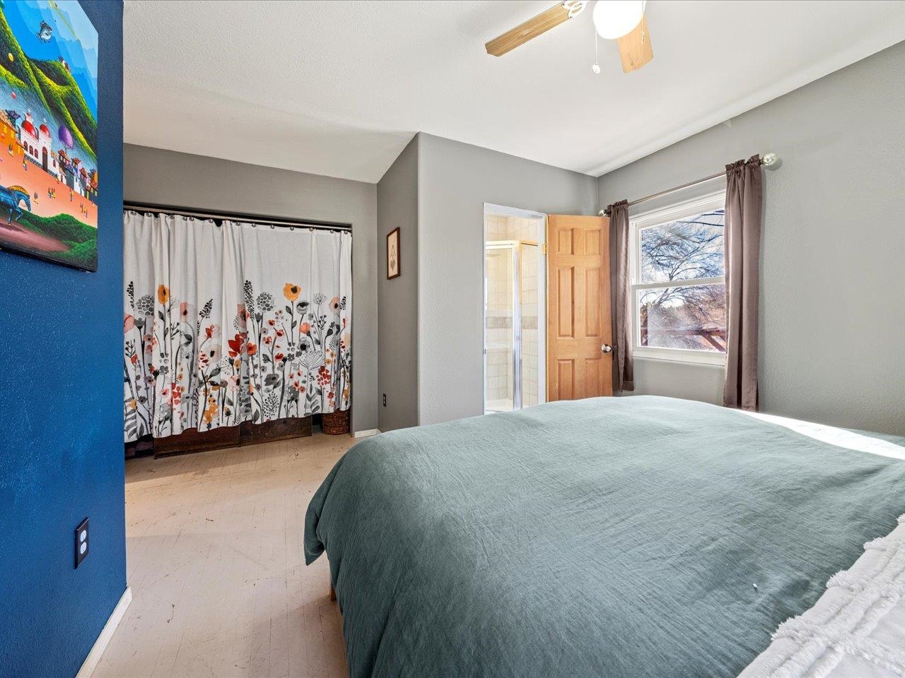 608 Bluff Street Delta, CO 81416 - Photo 23 of 42 a bedroom with a bed and a window