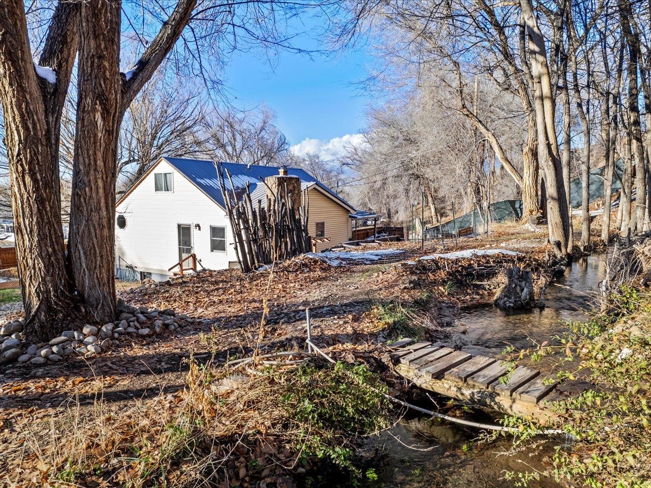 608 Bluff Street Delta, CO 81416 - Photo 10 of 42 a backyard of a house