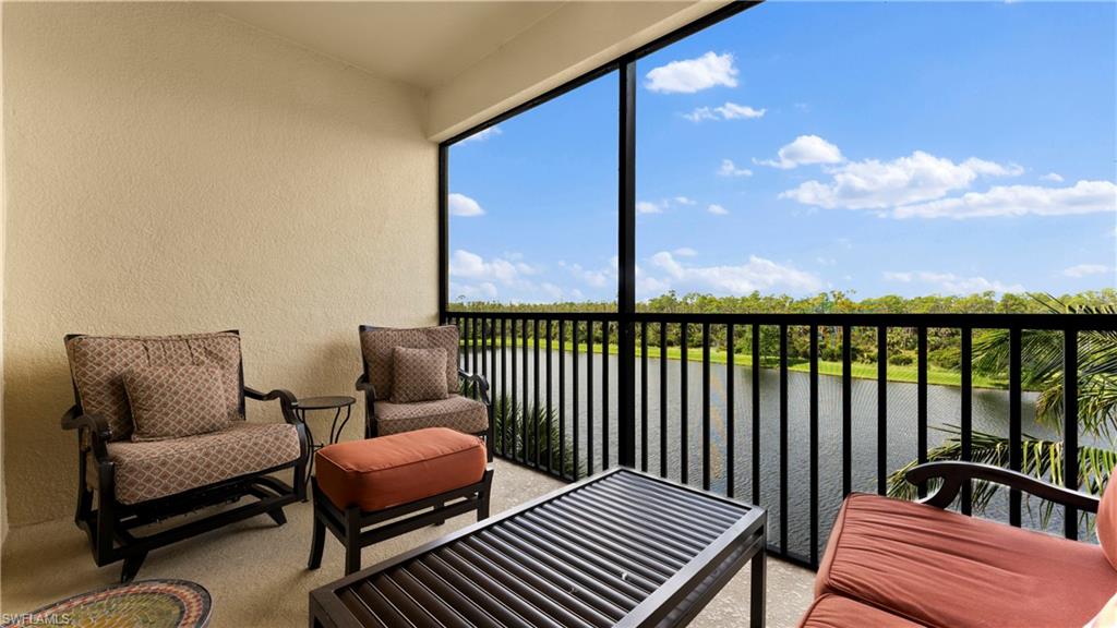 9727 Acqua Court, Unit 444 Naples, FL 34113 - Photo 17 of 25 a balcony with furniture
