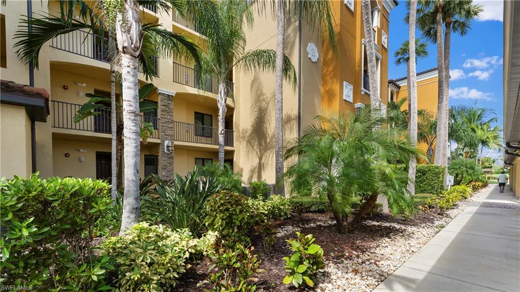 9727 Acqua Court, Unit 444 Naples, FL 34113 - Photo 21 of 25 a view of a multi story building