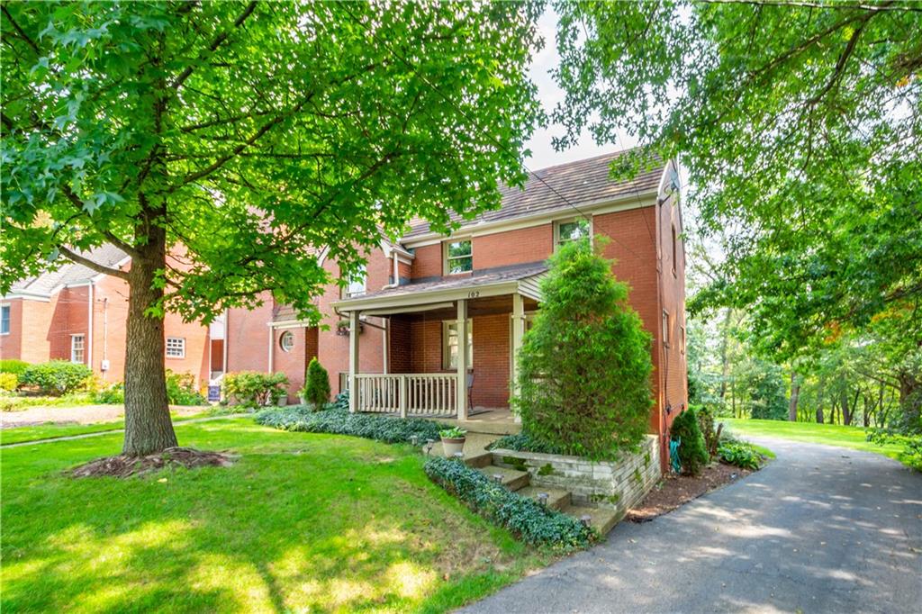 102 Conewanta Road Pittsburgh, PA 15241 - Photo 2 of 25 a front view of house with yard and green space