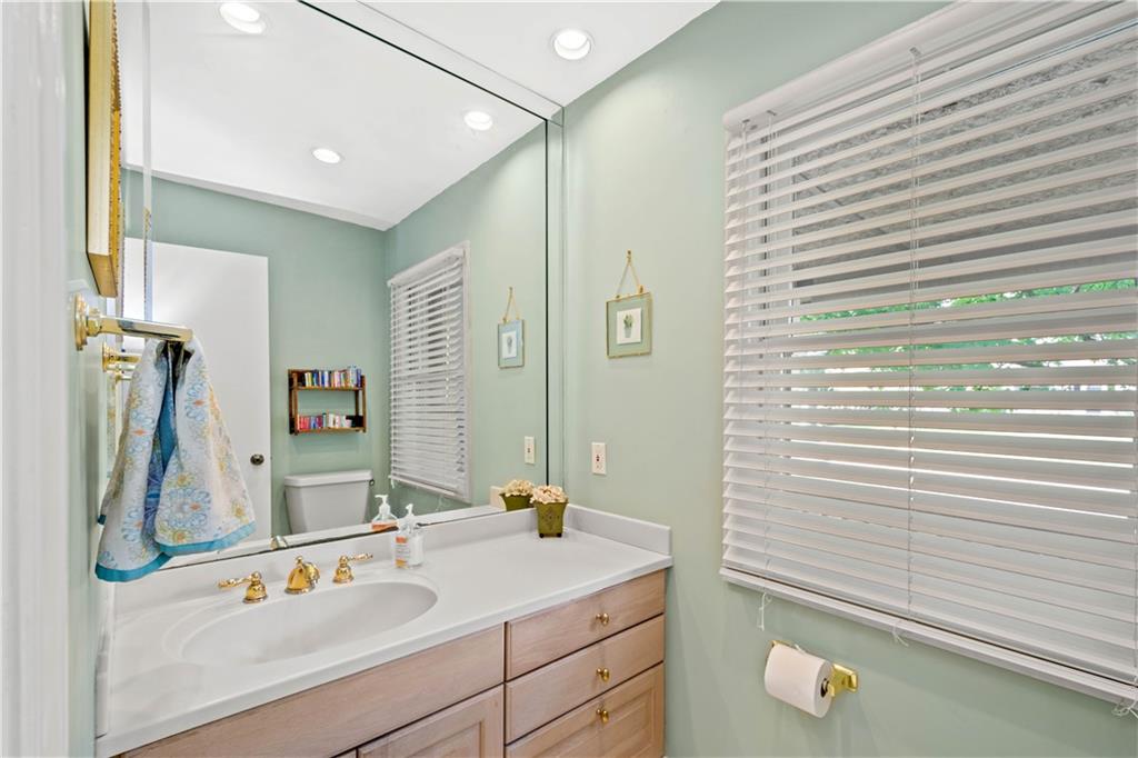 102 Conewanta Road Pittsburgh, PA 15241 - Photo 14 of 25 a bathroom with a sink and a mirror