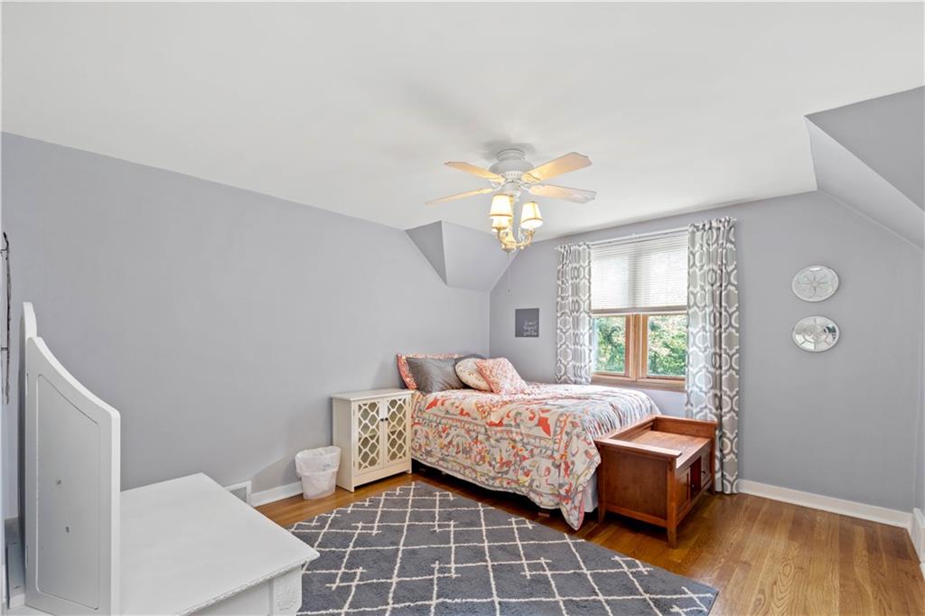 102 Conewanta Road Pittsburgh, PA 15241 - Photo 17 of 25 a bedroom with a bed and window