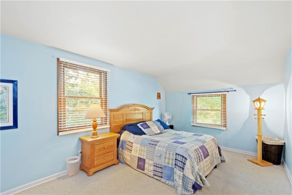 102 Conewanta Road Pittsburgh, PA 15241 - Photo 19 of 25 a bedroom with a bed and window