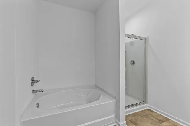 a bathroom with a sink and a bathtub