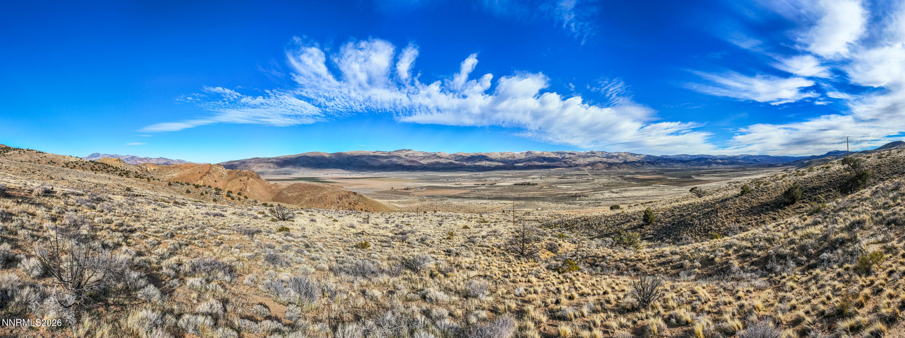 0 Ironwood Road Reno, NV 89510 - Photo 1 of 40 a view of a lake with a mountain in the background