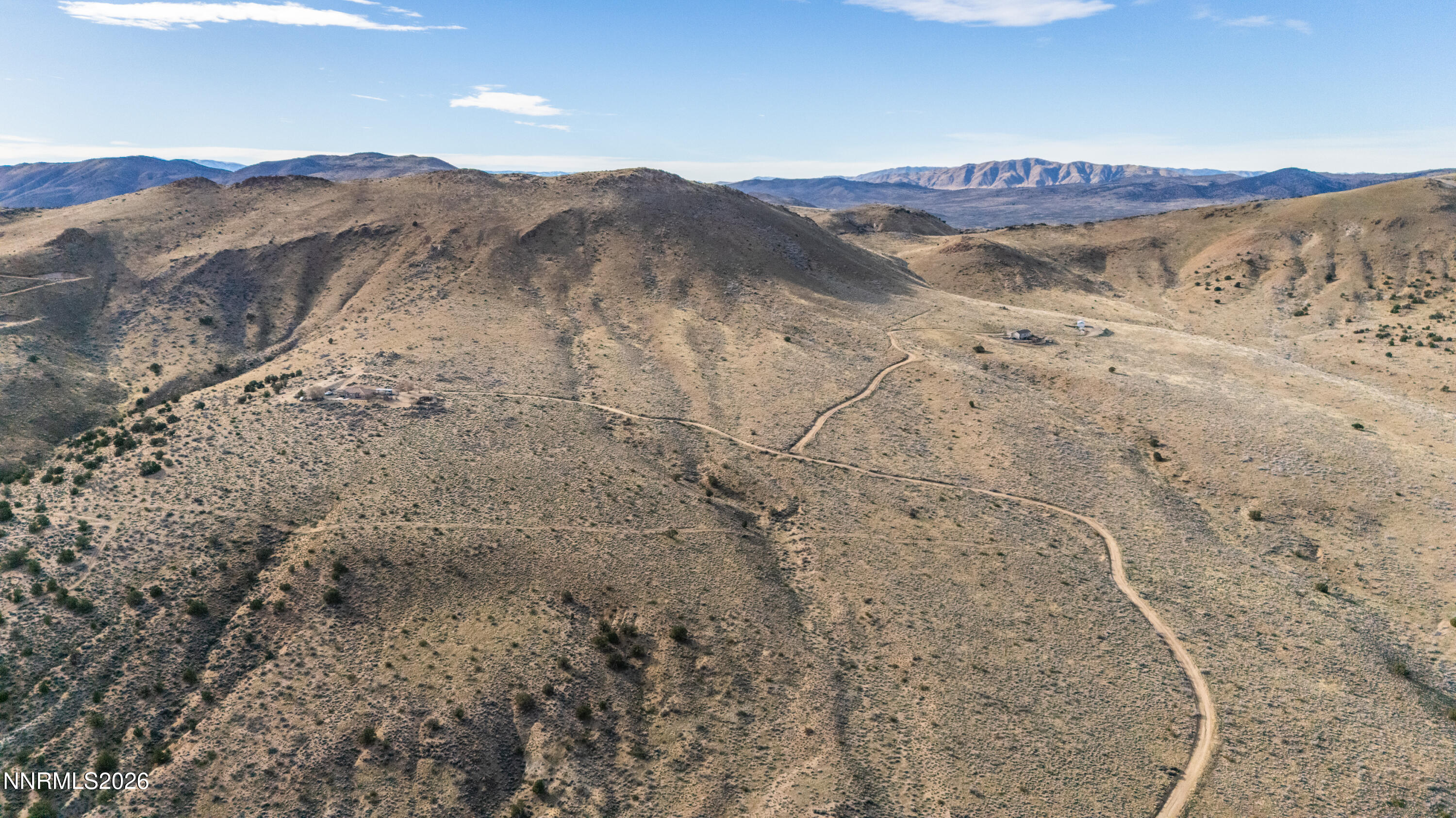 0 Ironwood Road Reno, NV 89510 - Photo 21 of 40 a view of a large mountains with mountains in the background