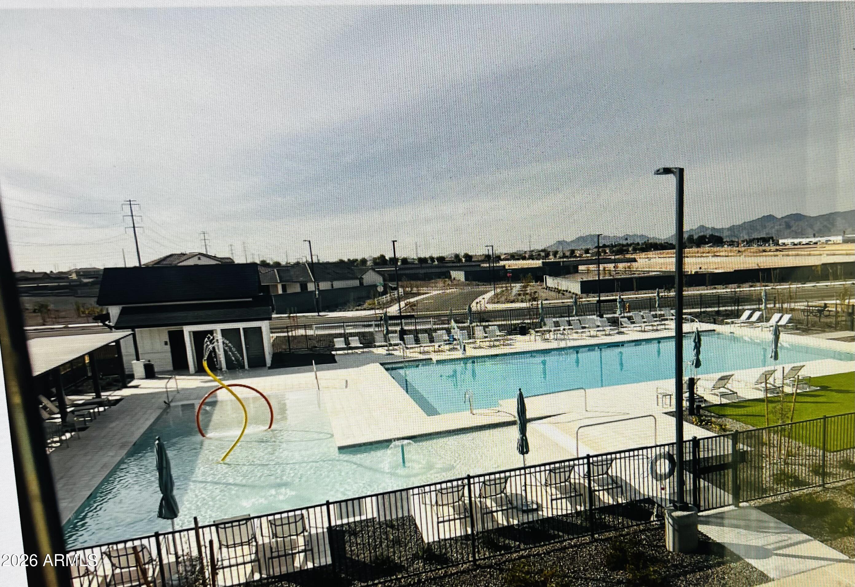 3375 South 181st Lane Goodyear, AZ 85338 - Photo 3 of 4 a view of a balcony with chairs
