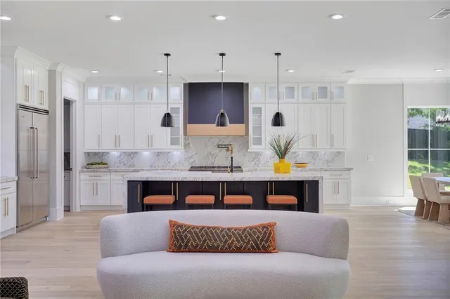 a bedroom with a bed and a fireplace