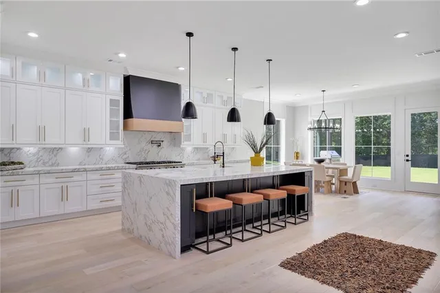 a bathroom with a double vanity sink mirror and double