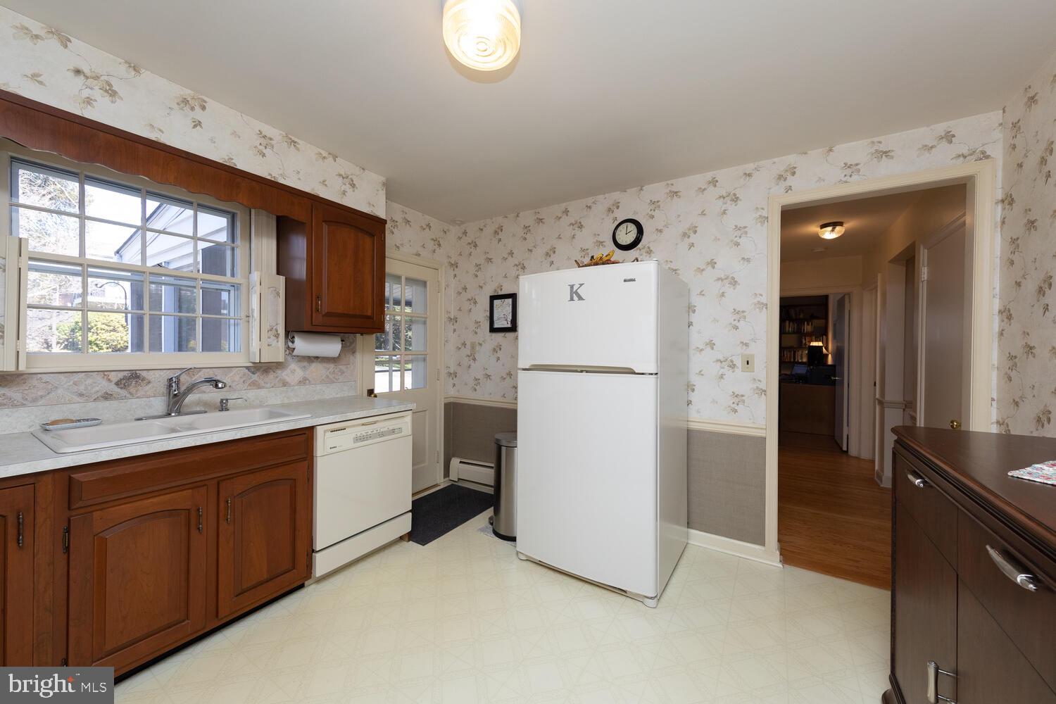 2129 Benezet Road Abington, PA 19001 - Photo 13 of 36 Kitchen with doorway to screened porch
