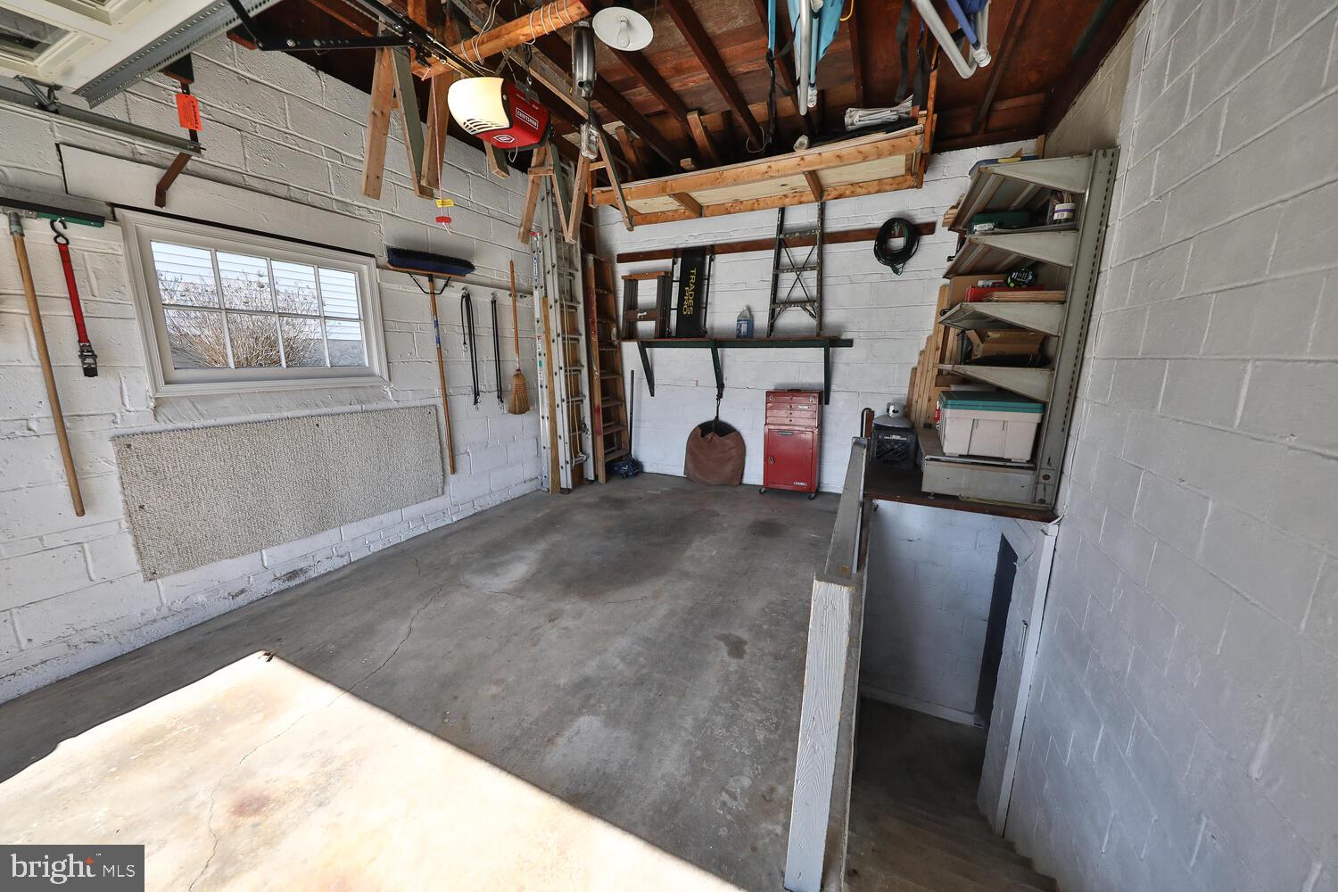 2129 Benezet Road Abington, PA 19001 - Photo 32 of 36 Attached garage with stairway to basement