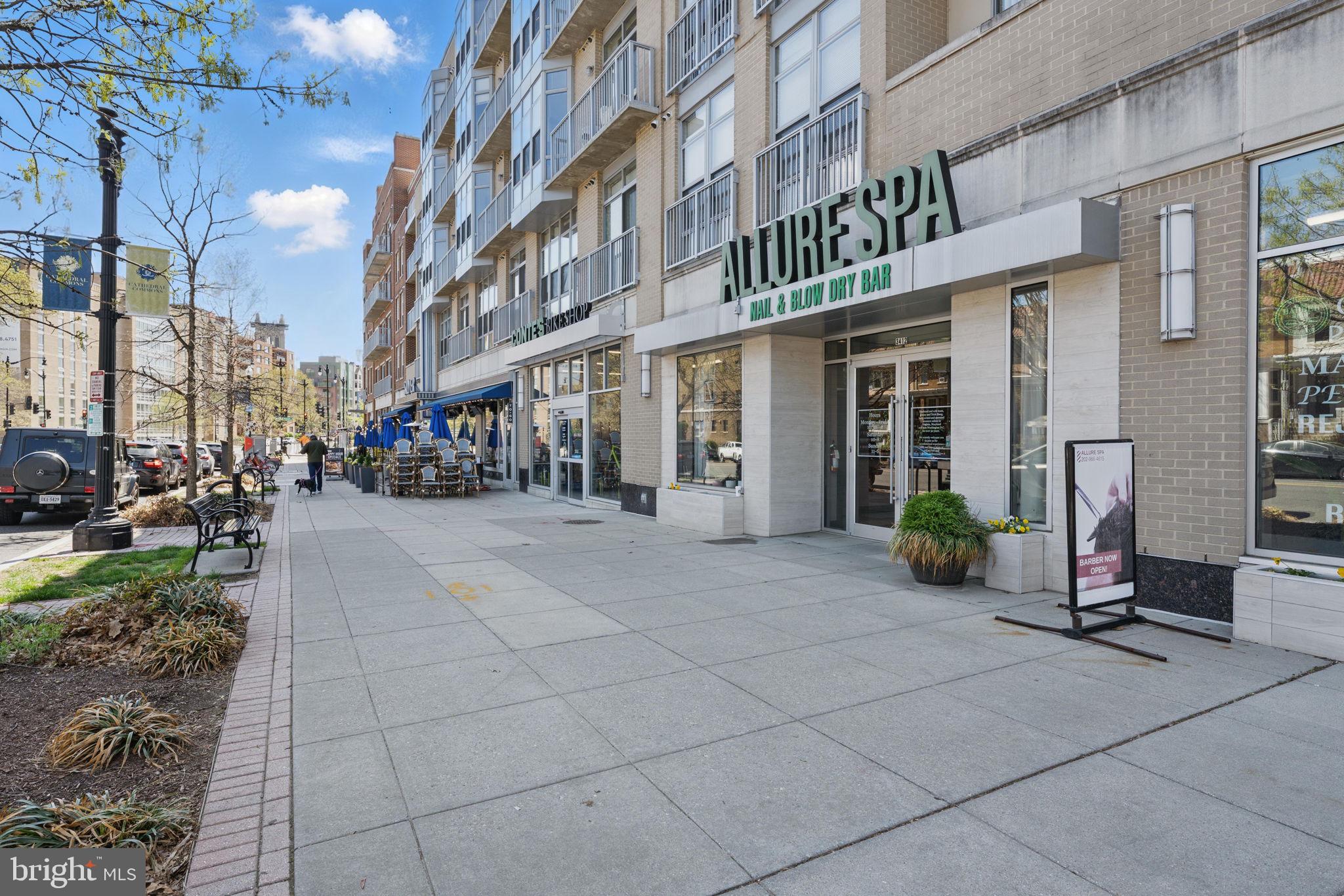3611 38th Street Northwest, Unit 209 Washington, DC 20016 - Photo 27 of 30 a view of a building with cars