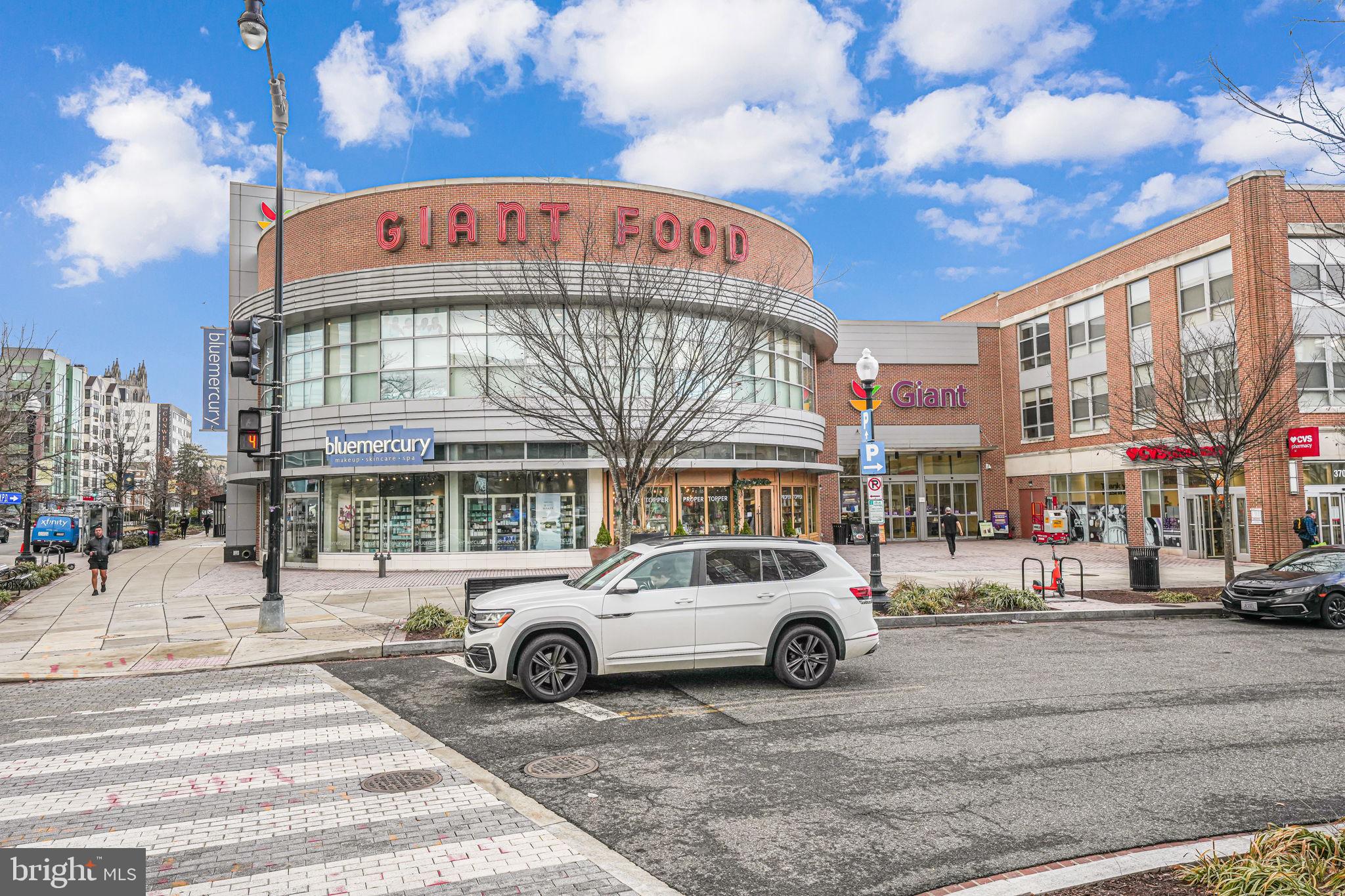 3611 38th Street Northwest, Unit 209 Washington, DC 20016 - Photo 29 of 30 a car parked on the side of a street