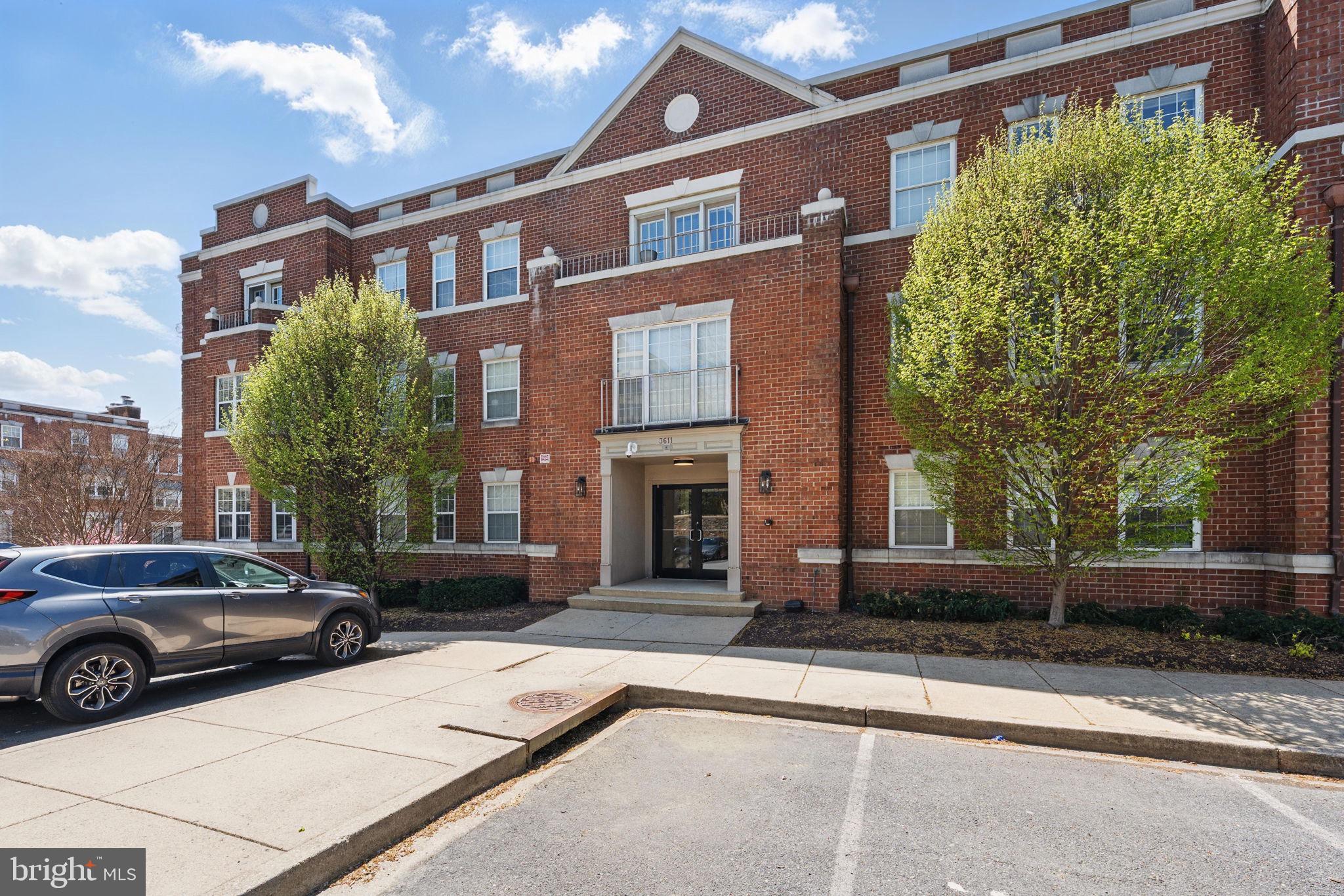 3611 38th Street Northwest, Unit 209 Washington, DC 20016 - Photo 3 of 30 a view of a car parked in front of a building