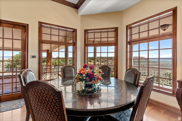 5615 East Eight Mile Gap Road Kanab, UT 84741 - Photo 8 of 81 Dining space with crown molding and wood finished floors