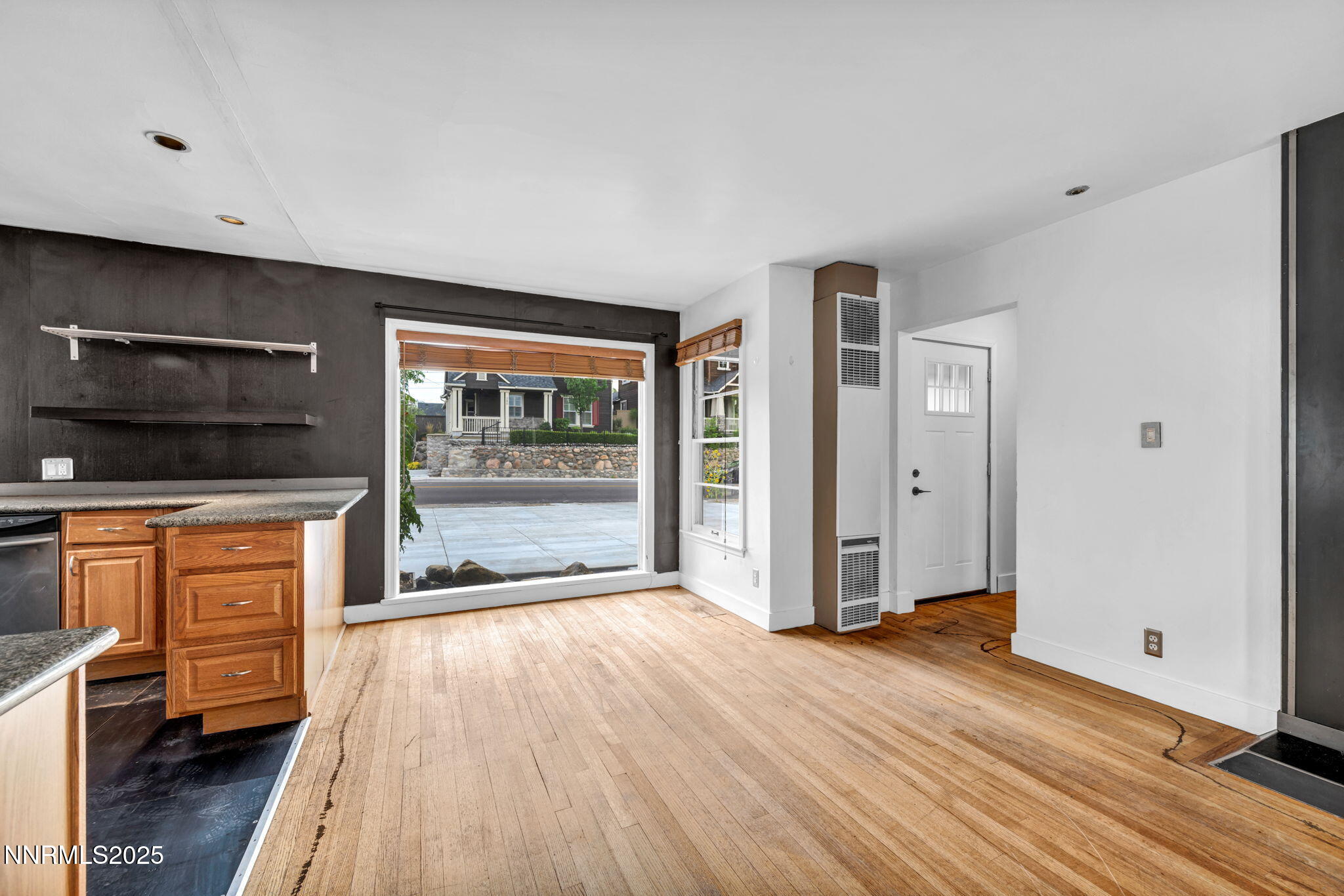 343-347 Mt Rose Street Reno, NV 89509 - Photo 21 of 46 a view of a kitchen with wooden floor and electronic appliances