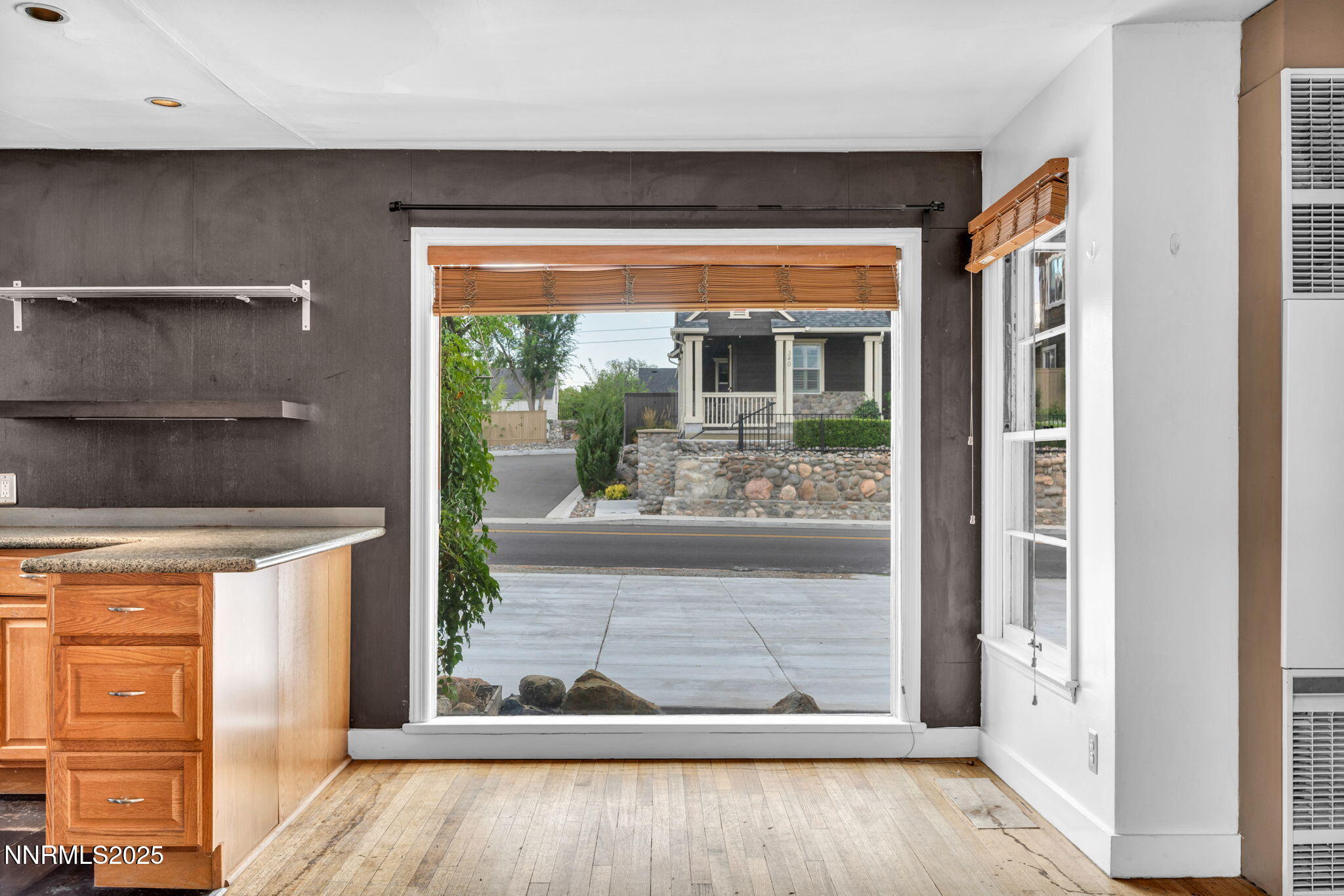 343-347 Mt Rose Street Reno, NV 89509 - Photo 23 of 46 a view of a living room and a large window with wooden floor