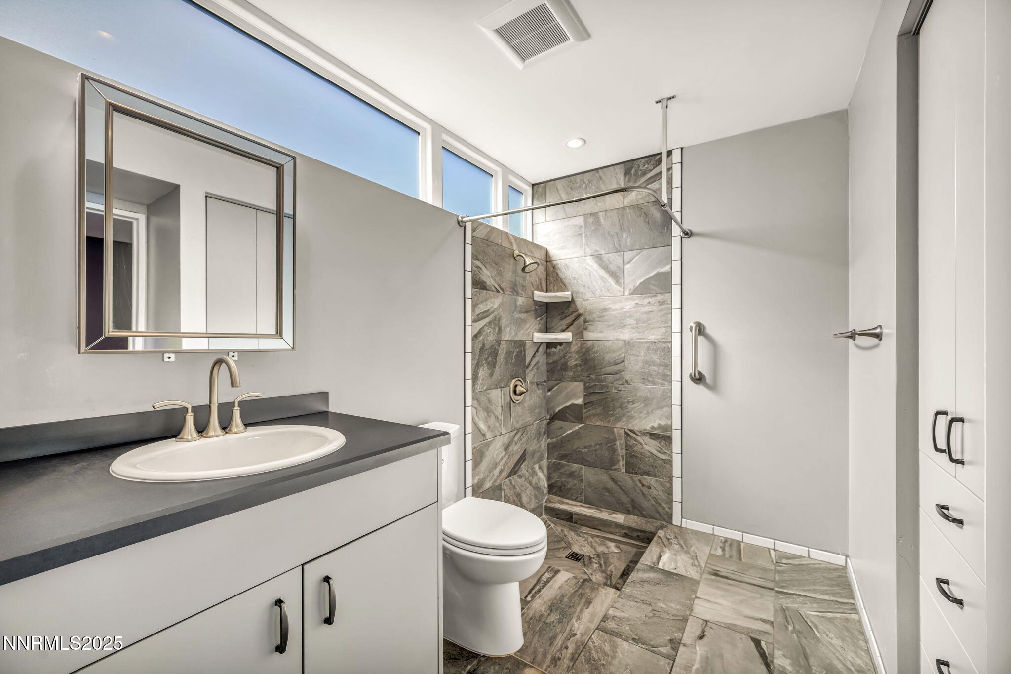 343-347 Mt Rose Street Reno, NV 89509 - Photo 46 of 46 a bathroom with a sink toilet and shower