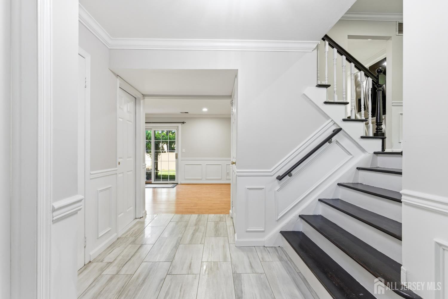 5 McKinley Street Edison, NJ 08820 - Photo 5 of 38 a view of entryway and hall with wooden floor