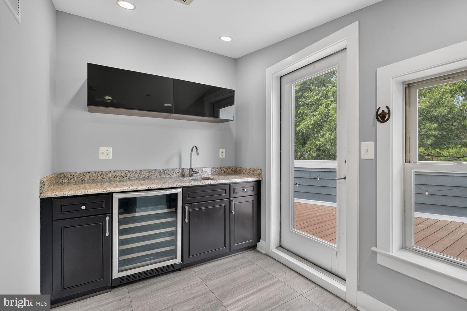 2126 3rd Street Northeast, Unit B Washington, DC 20002 - Photo 21 of 32 Wet bar with Roof Deck access