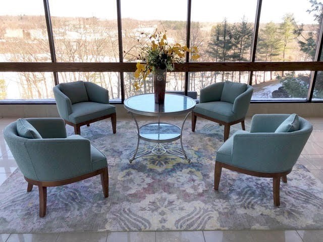 40 Village Road, Unit 309 Middleton, MA 01949 - Photo 12 of 22 a living room with furniture and a floor to ceiling window