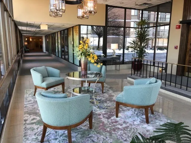 a view of workspace with lounge chair